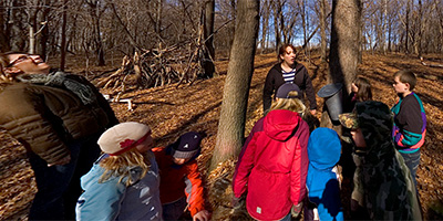 Tapping a maple tree on the first day of spring.