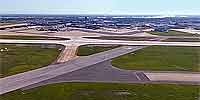Aerial panorama of New Orleans Louis Armstrong International Airport.