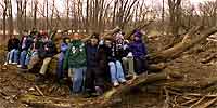 Cooler Crew in Crosby Park at the log where the 2005 Pioneer Press Treasure Hunt medallion was found.